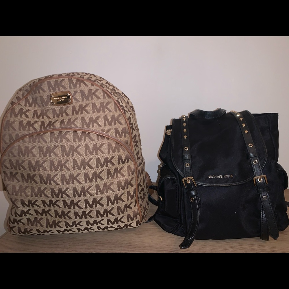 2 Michael Kors backpacks